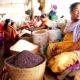An Eema selling glutinous rice at Eema Bazaar. Glutinous rice is used in Manipur for preparing various dishes such as kheer, sweetdishes, changlhah etc. Location - Eema Bazaar, Imphal, Manipur. (Eema - Mother, Eema Bazaar - a bazaar in Imphal "manned" exclusively by women.)