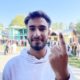 A woman displays ink on her finger after casting her vote in Pulwama, Kashmir on September 18, 2024. [FPK Photo/ Qayoom Khan]